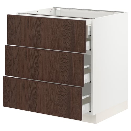 An ikea SEKTION kitchen cabinet with white base and dark brown wood drawers. It has three full-extension drawers with soft-close mechanism.