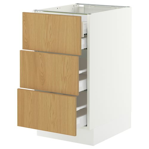 SEKTION kitchen cabinet in white with oak veneer drawers, modern design.