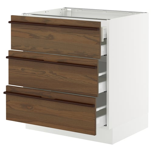 White and brown wooden kitchen drawers, modern design, four-tiered drawers, flat front.