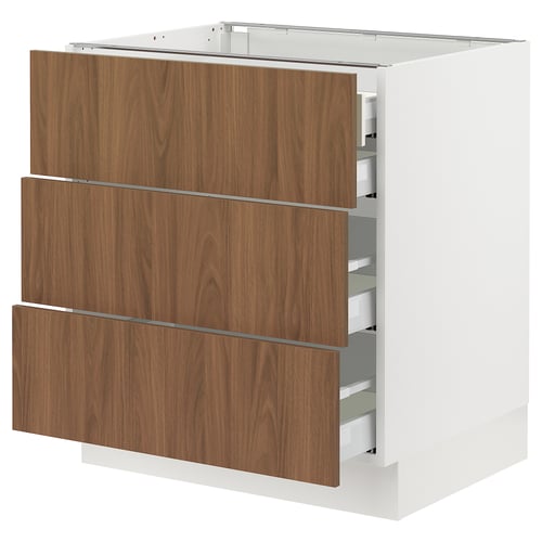 Modern white kitchen cabinet with walnut drawers, three drawers, sleek design.