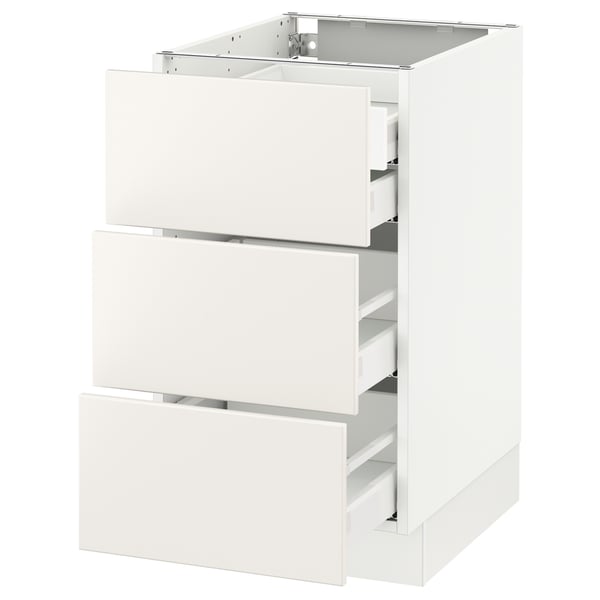 A white SEKTION kitchen cabinet with three drawers. The design is modern and minimalist with sleek drawer fronts.