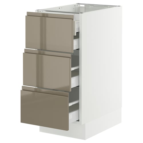 A modern, white kitchen cabinet with three shiny dark grey-brown drawers. The cabinet is sleek and integrated handles.