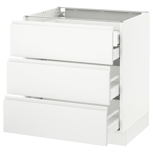 A white SEKTION kitchen cabinet with three drawers, featuring a modern, minimalist design with integrated handles.