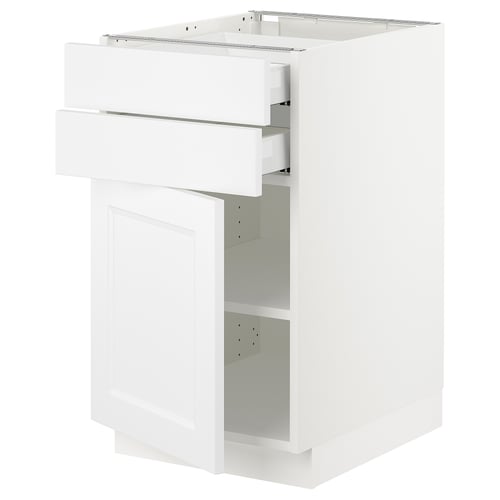 White kitchen cabinet with drawers and shelves.