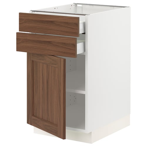 A white SEKTION kitchen cabinet with walnut-look drawers and a door, featuring a sleek and modern design.