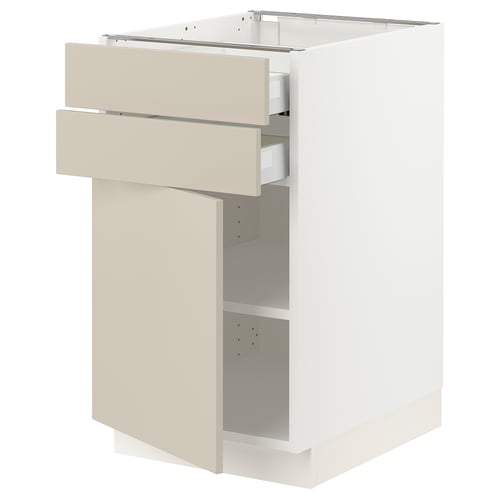 White ikea SEKTION kitchen cabinet with beige drawers, minimalist design.