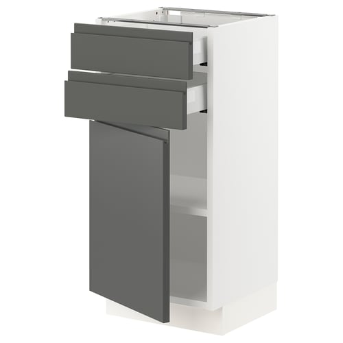 Modern kitchen unit, white & grey, sleek drawers, adjustable shelves.