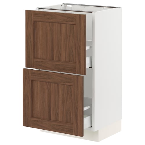 An ikea SEKTION kitchen cabinet with walnut-brown panels and white sides, exhibiting a classic and warm design.