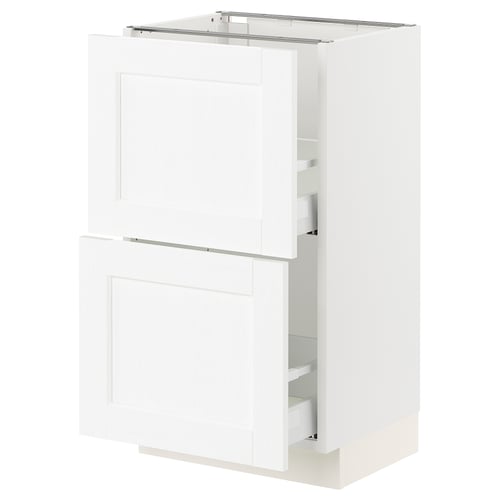 A white SEKTION kitchen cabinet with a smooth drawer and door. Its sleek with modern design, featuring a sturdy frame.