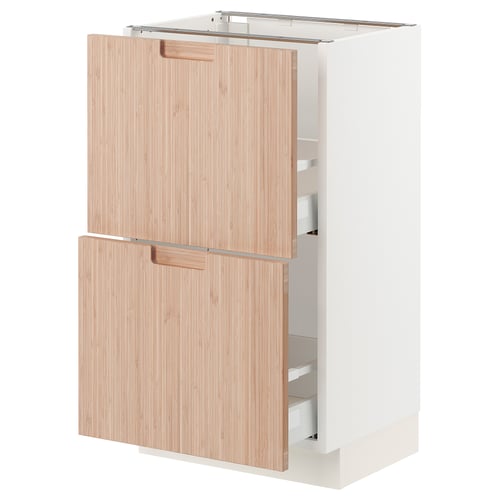 SEKTION white kitchen cabinet with light bamboo drawers and doors.