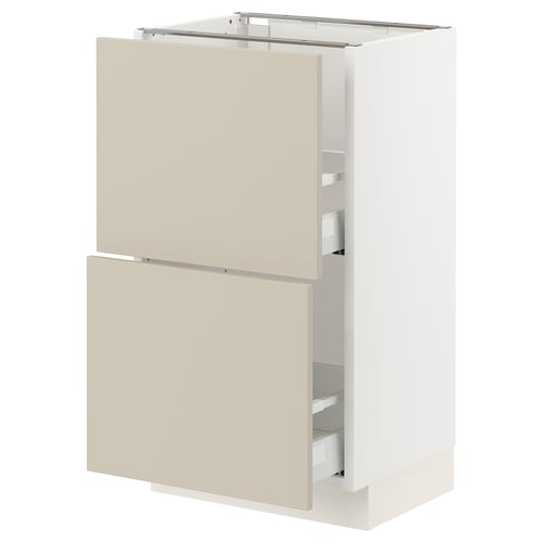 An ikea SEKTION kitchen cabinet in white with beige drawers. It has a sleek design with smooth surfaces and a sturdy frame.