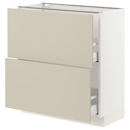 An ikea SEKTION kitchen cabinet with havstorp beige fronts, featuring a smooth, modern design and two full-extension drawers.