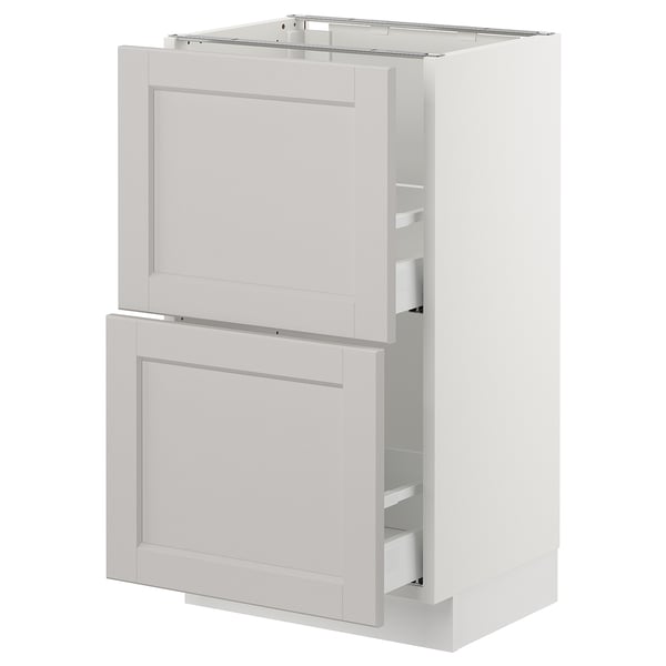 A SEKTION kitchen cabinet with white lerhyttan fronts, featuring two drawers and a door.