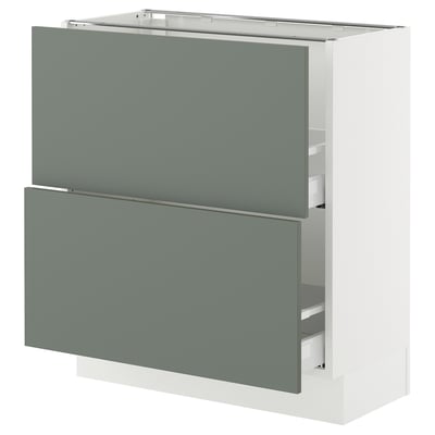 An ikea SEKTION kitchen cabinet with gray-green nickeby drawers in a modern design.
