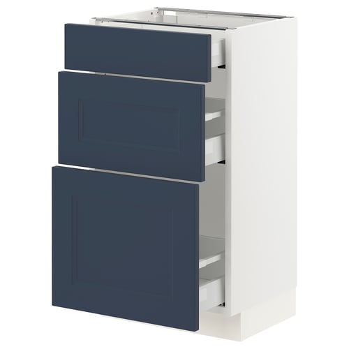 A kitchen cabinet with white framework and three blue drawers. Sleek, modern design.