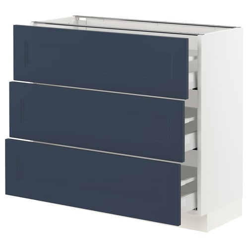 An ikea SEKTION kitchen cabinet with blue axstad drawers. Its rectangular, white, and has three blue drawers with a modern design.
