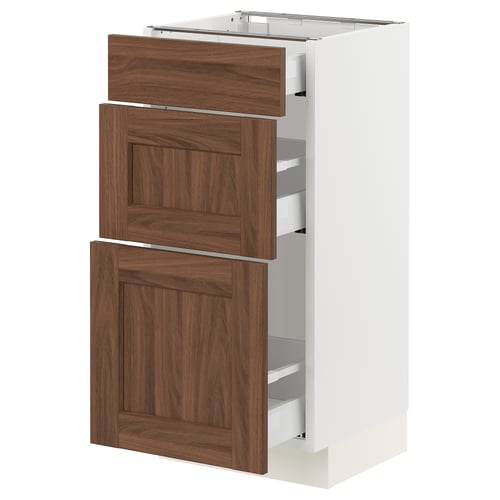 SEKTION kitchen cabinet with walnut wooden drawers and white frame.