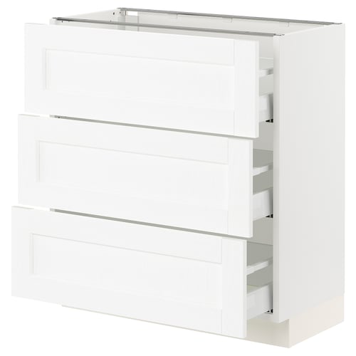 Displays a white SEKTION kitchen cabinet with grain texture. It multiple drawers with smooth, full-extension slides.