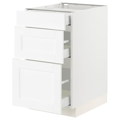 White SEKTION kitchen cabinet with wood grain texture and multiple drawers.