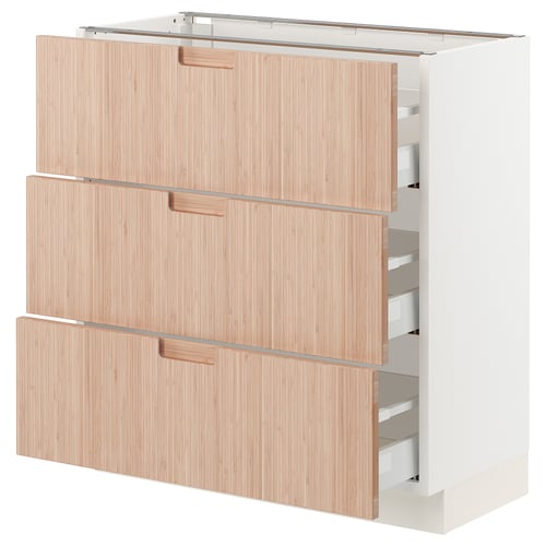 A SEKTION kitchen cabinet with three light wooden drawers, each featuring a sleek, modern design.