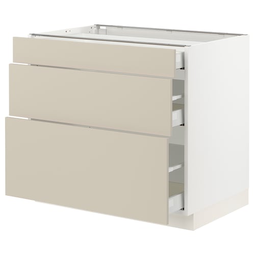Beige ikea SEKTION base cabinet with 3 soft-close drawers.