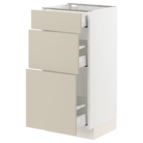 Beige SEKTION kitchen cabinet with three drawers, smooth finish.