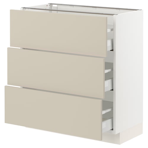 Ikea SEKTION kitchen unit in beige with three drawers.