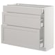Ikea SEKTION light grey cabinet with drawers and shelves.