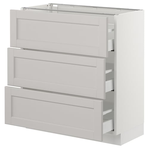 A white SEKTION kitchen cabinet with three pull-out drawers, offering a traditional design with bevelled edges.