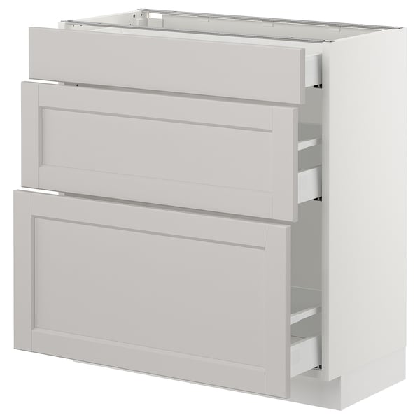 A white SEKTION kitchen cabinet with two drawers and a door, featuring a traditional design with bevelled edges.