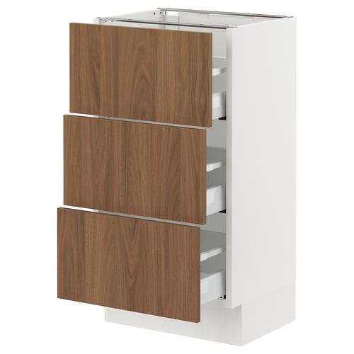 White SEKTION kitchen cabinet with three modern walnut drawers.