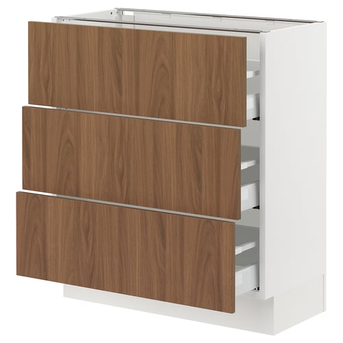 An ikea SEKTION kitchen cabinet with white frame and three wooden drawers in walnut finish.