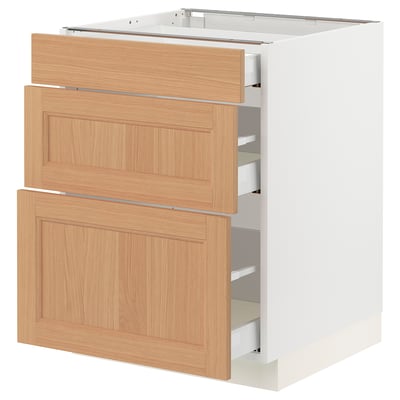 An ikea SEKTION kitchen cabinet with three wooden drawers in oak.