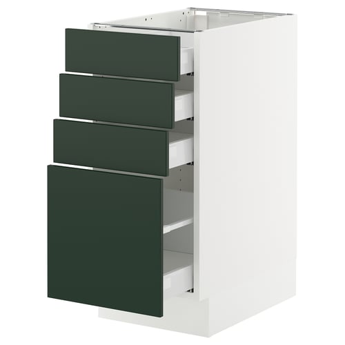 White multi-drawer kitchen cabinet with dark green drawer fronts.
