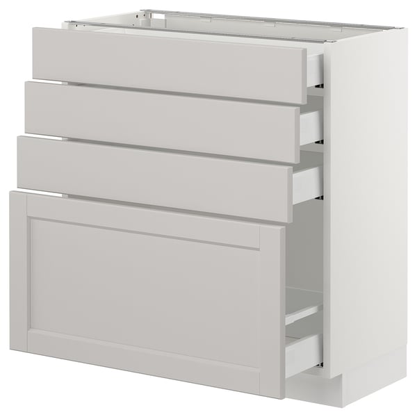 Ikea SEKTION light grey kitchen cabinet with beveled edges and multiple drawers.