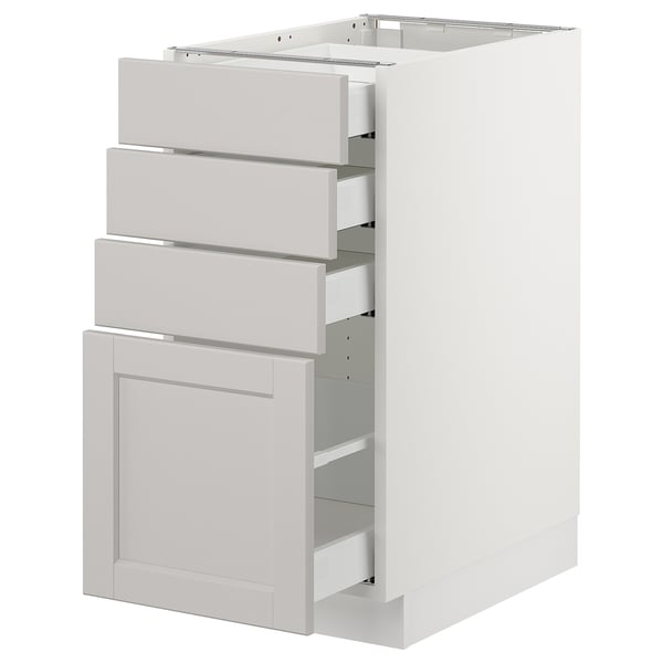 SEKTION, modern kitchen cabinet with light grey drawers and door, featuring a sleek, traditional design with bevelled edges.