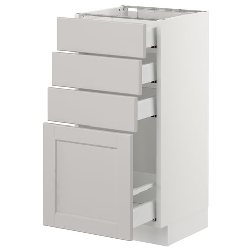 A white SEKTION kitchen cabinet with multiple drawers featuring bevelled edges.