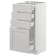 A white SEKTION kitchen cabinet with multiple drawers featuring bevelled edges.