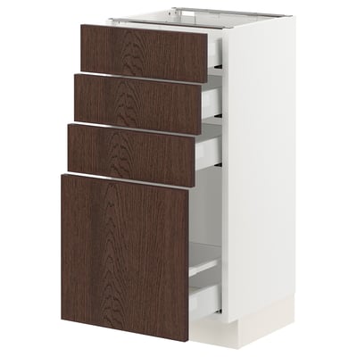 White SEKTION kitchen cabinet with dark brown wood drawers, sleek and modern design.
