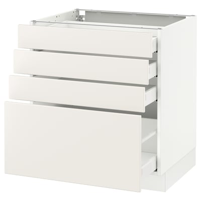Ikea SEKTION white kitchen cabinet with four drawers.