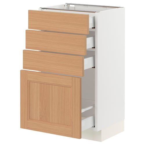 An ikea SEKTION kitchen cabinet with white base, oak drawers, and a plain door.