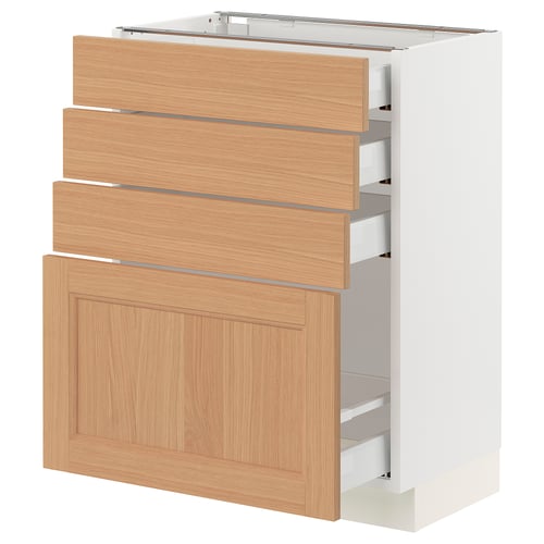 An ikea SEKTION kitchen cabinet with oak drawers. It has a natural wood finish and four drawers. Two are slightly open, revealing the white interior.