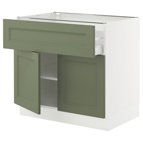 SEKTION kitchen cabinet in green, white top. Drawers and shelves, modern design.