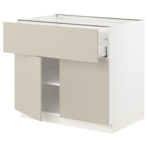 SEKTION kitchen unit in beige with smooth surfaces and medium drawer.