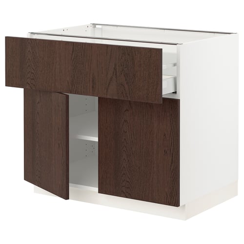 Modern kitchen unit with dark brown sinarp doors and white base, featuring adjustable shelves and drawer.