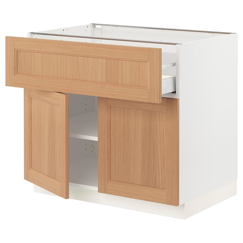 SEKTION kitchen: oak drawers, white base, adjustable shelves.