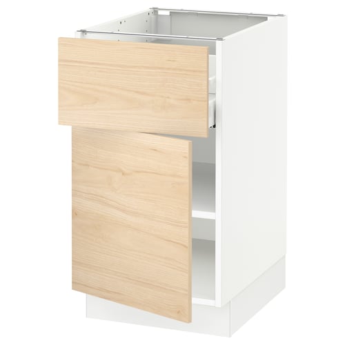 A white SEKTION kitchen cabinet with a light wooden drawer and door, featuring modern design with minimalist aesthetic.