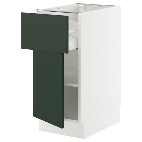 White kitchen cabinet with green doors, adjustable shelves, and modern design.
