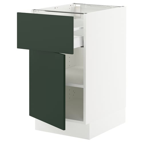 Modern white kitchen cabinet with green drawers & built-in dampers.