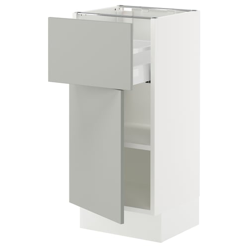 SEKTION kitchen cabinet in light grey with adjustable shelves and soft-close drawer.